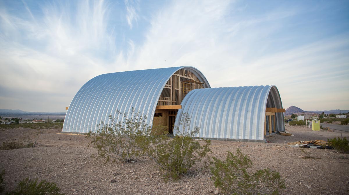 2 S-Model buildings under construction in the desert