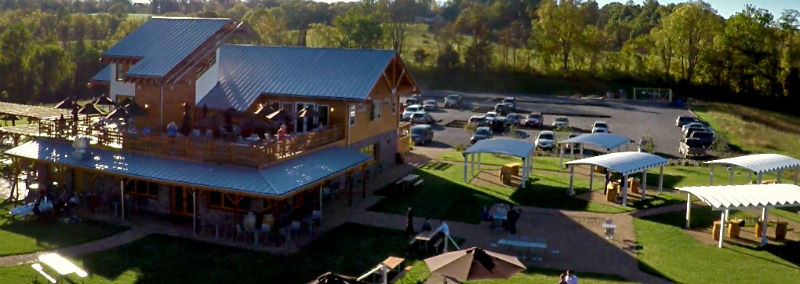 aerial view of multiple steel carports for vineyard