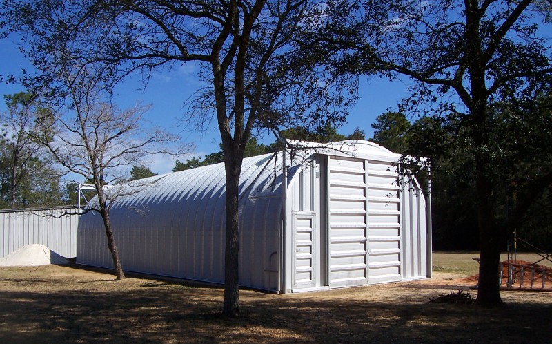 steel quonset hut building with sliding doors