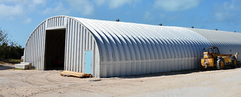 addition of steel arches onto s model storage building