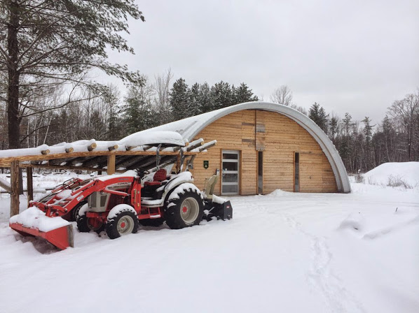 quonset hut home in the snow