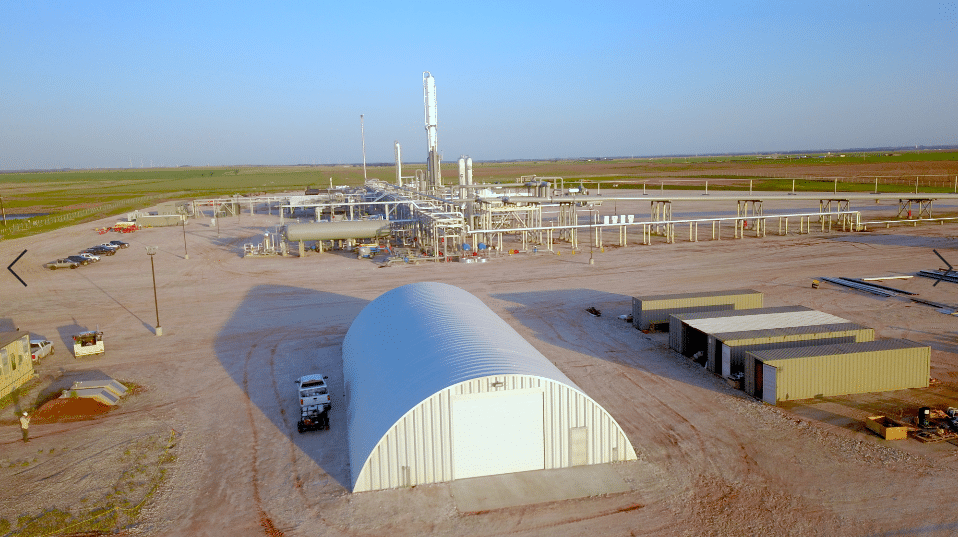 steel quonset hut at industrial processing site