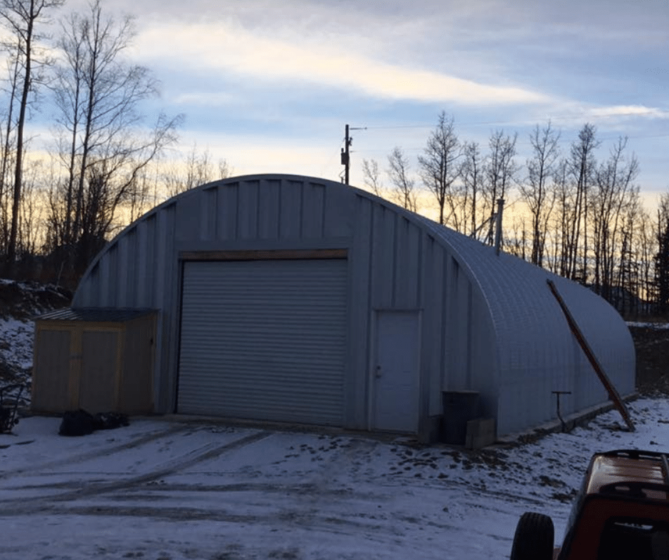 s model steel building in Alaska with steel endwall and white garage door