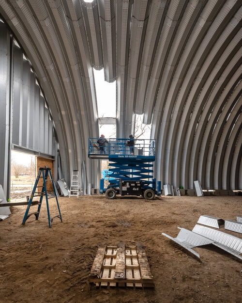 Steel arches with cut outs for skylights 