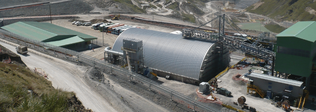 Large industrial mining facility with steel quonset hut