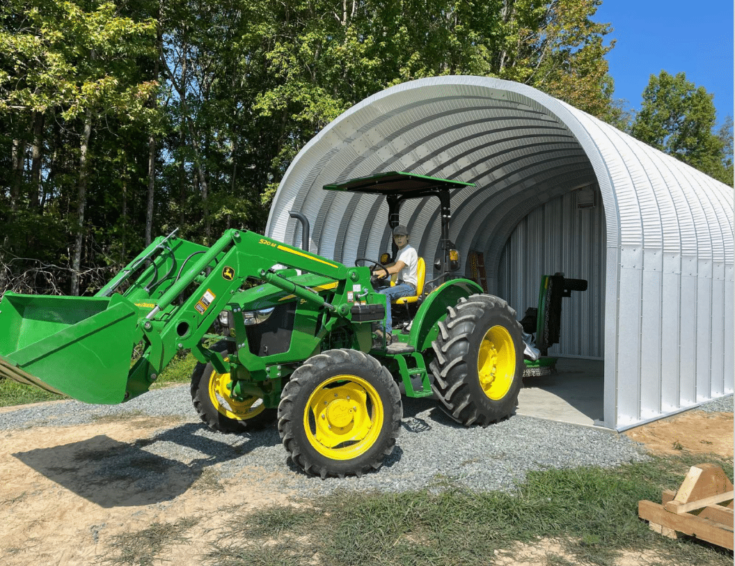 Green tractor in a S-Model shed