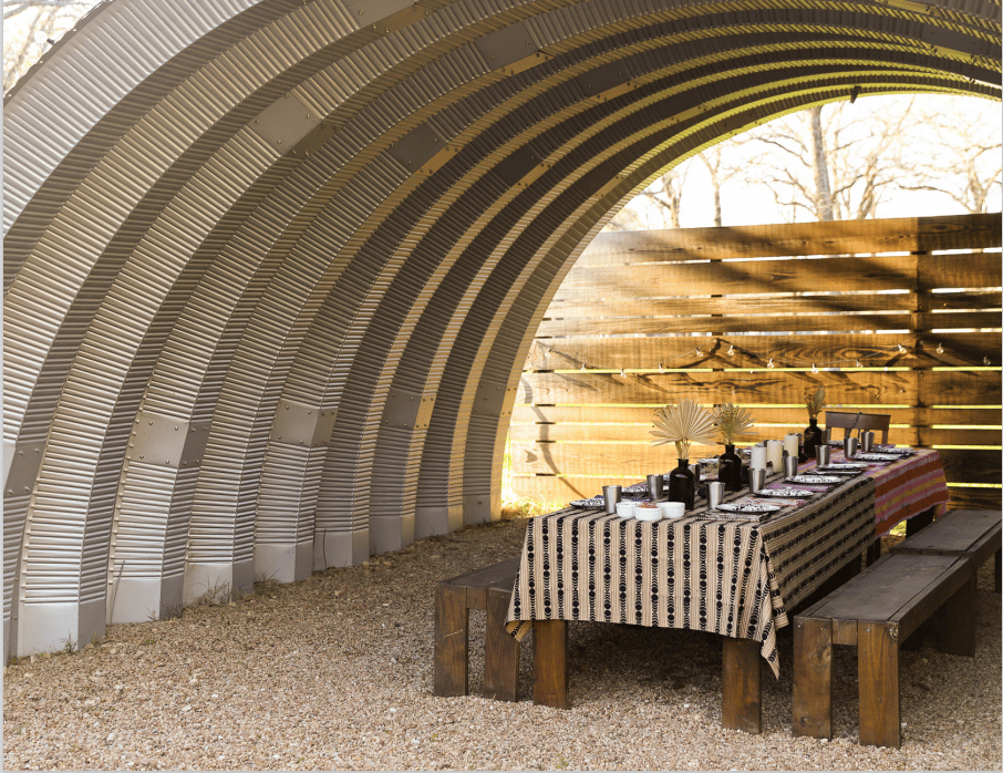 picnic table under steel arches