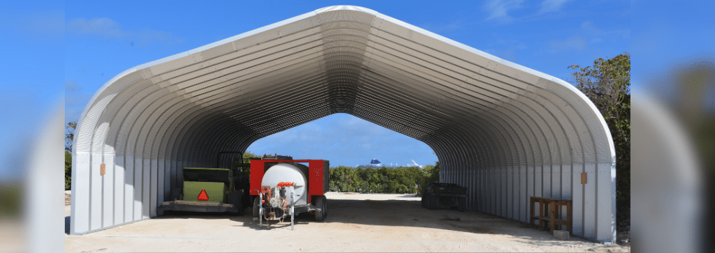 a-model open ended quonset structure with equipment stored underneath