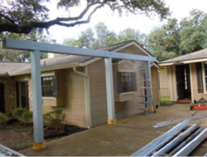 Step 1: Bolt steel columns to columns & foundation