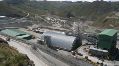 large q-model quonset hut in industrial mining field in mountains