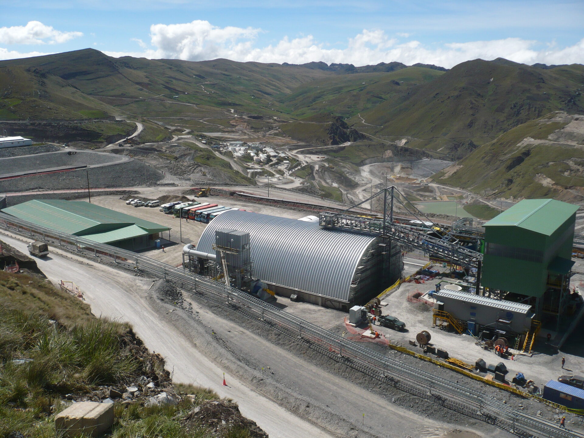 large q-model quonset hut in industrial mining field in mountains