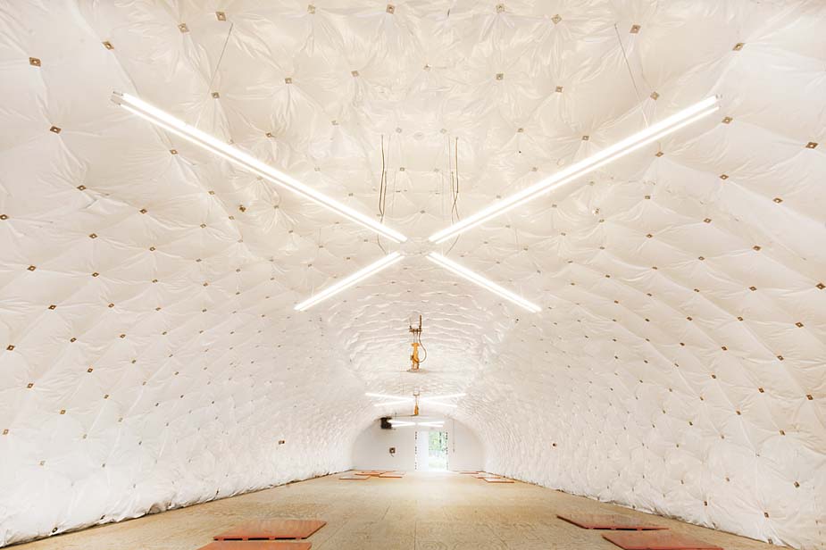 insulation and lighting inside of quonset building