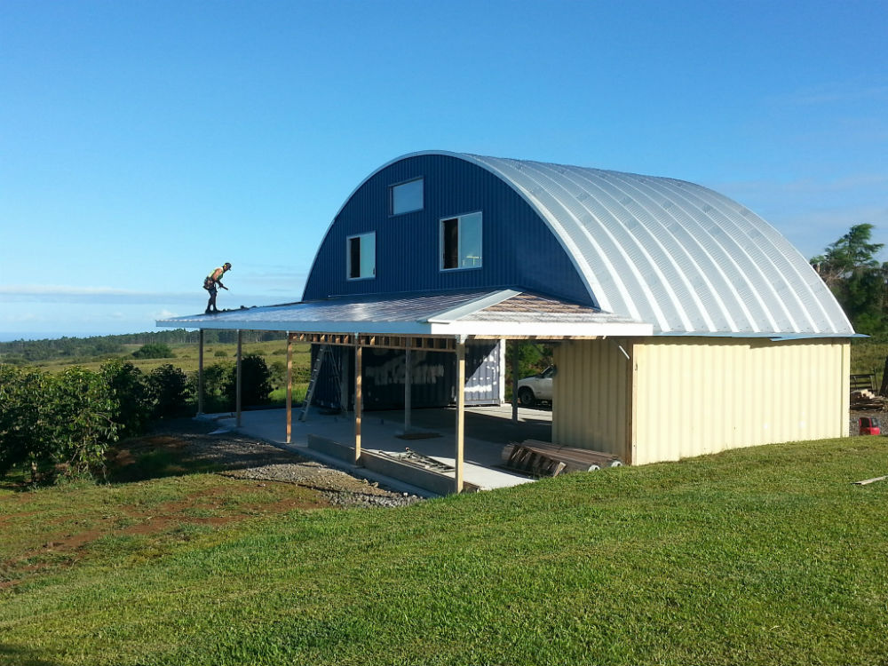 retail business roofing system on top of containers with custom blue endwalls