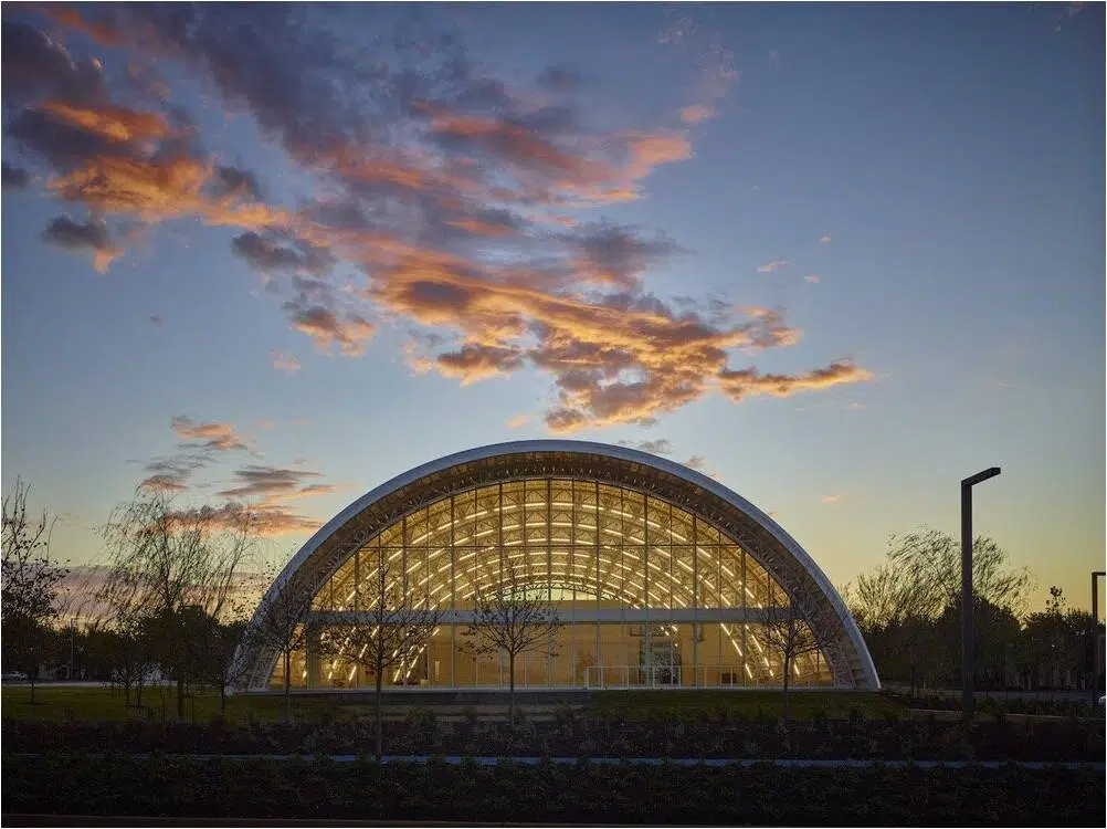 Q-model quonset at sunset, glass endwall