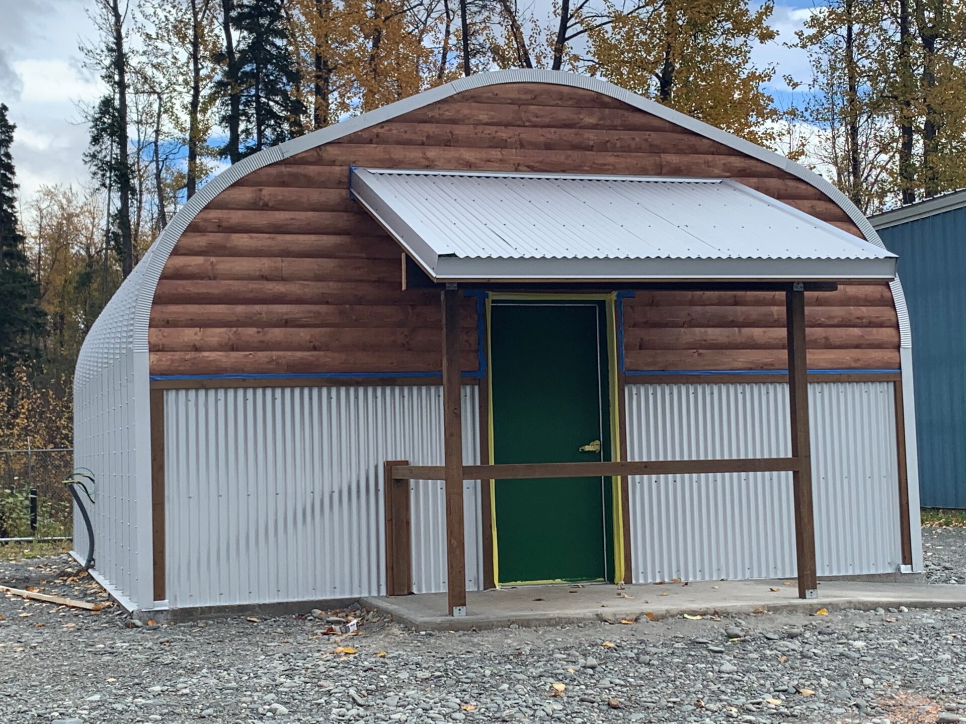 steel A model arch style building with custom endwall and awning used for a dispensary
