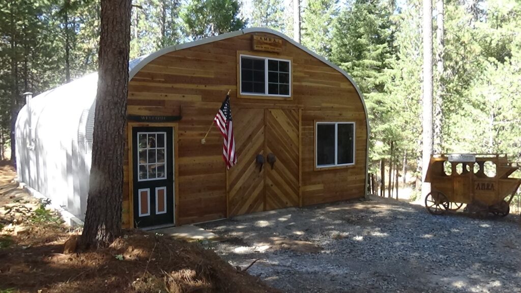 a model steel fil studio with custom wood front endwall with windows