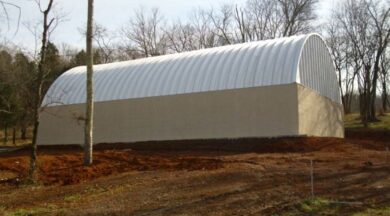 salt storage steel roofing system on concrete knee wall with steel endwalls