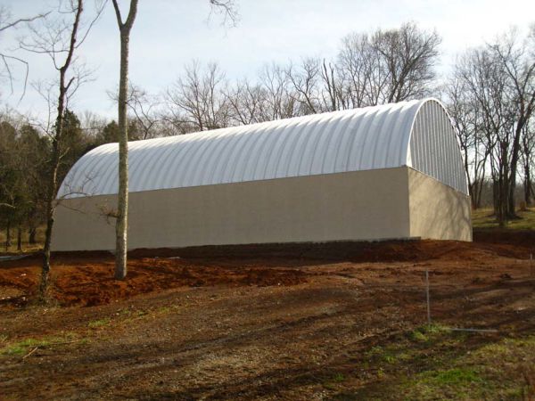 salt storage steel roofing system on concrete knee wall with steel endwalls