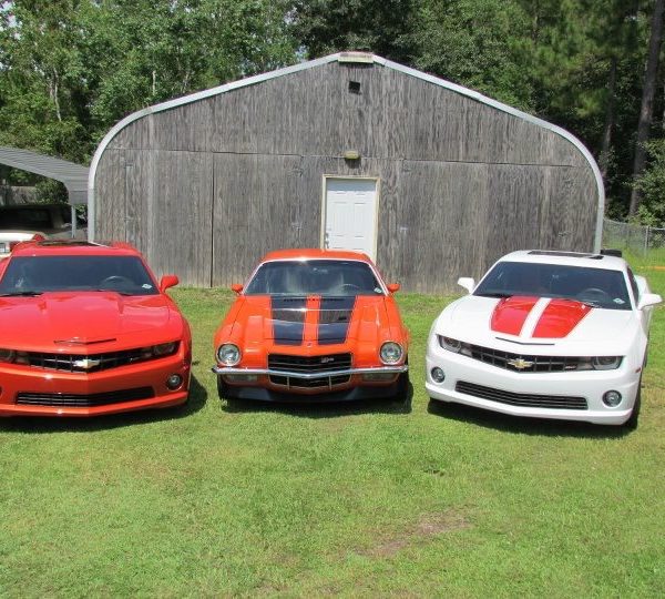 A-Model garage with 3 vehicles in front 