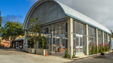 exterior of large Q model steel arches used for a roofing system at a restaurant in TX with custom side and enwalls