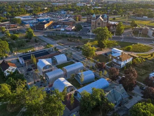 Above view of an eight Quonset hut community in Detroit.