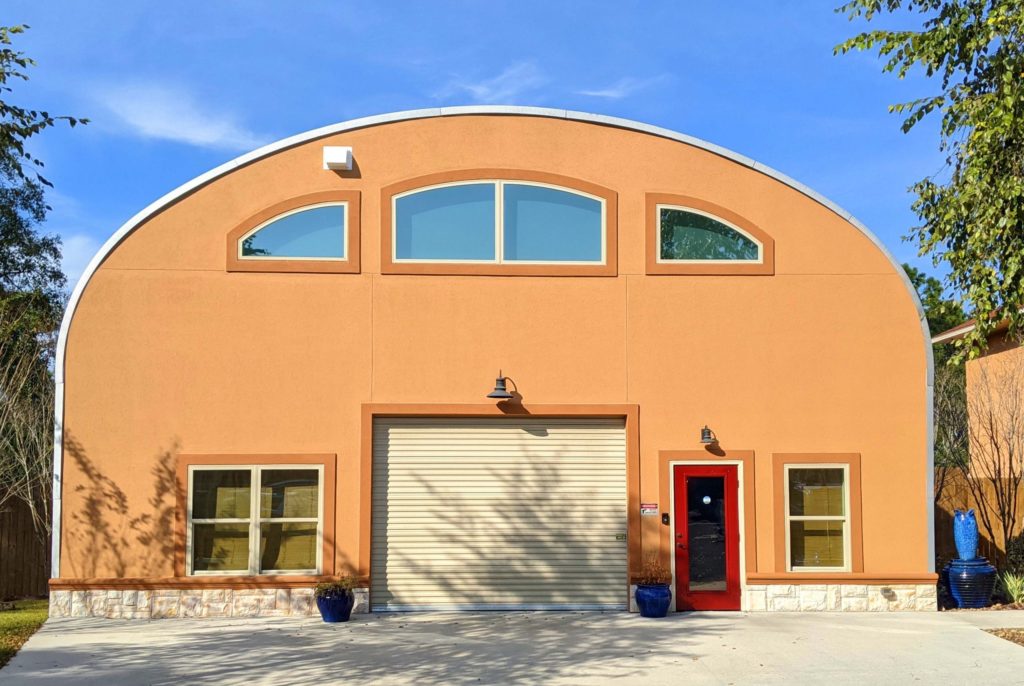 s-model quonset home with orange custom endwall