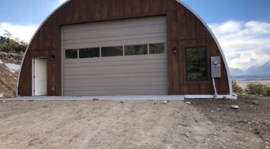 S-Model Quonset with custom brown end wall and brown overhead door