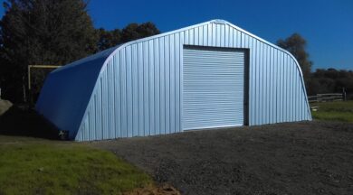 X-Model Quonset hut with steel end wall and steel garage door