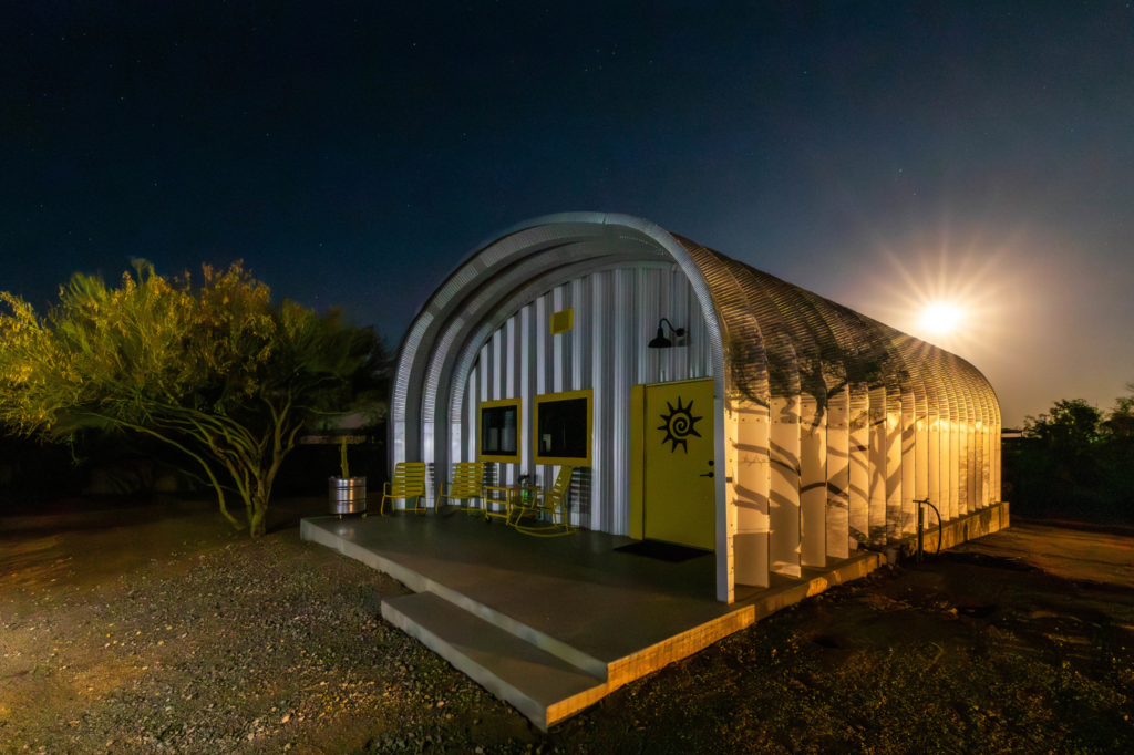 S-Model Cabin with steel front end wall at night 